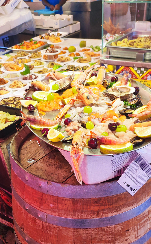 A large display of fresh seafood found at the Sicilian food market of Capo in Palermo.
