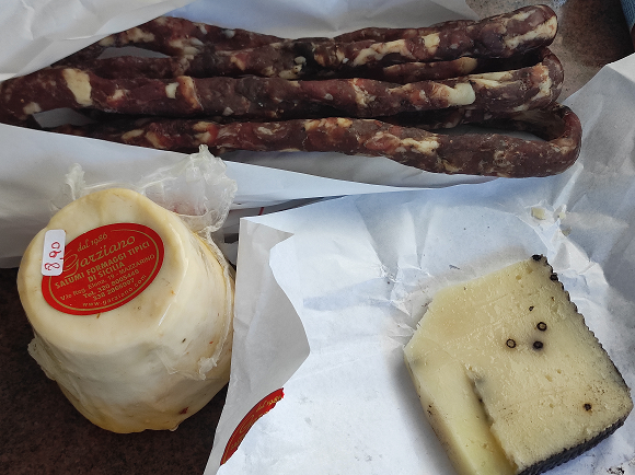 Local dried sausage and artisanal cheeses purchased at the Partanna Livestock Fair.